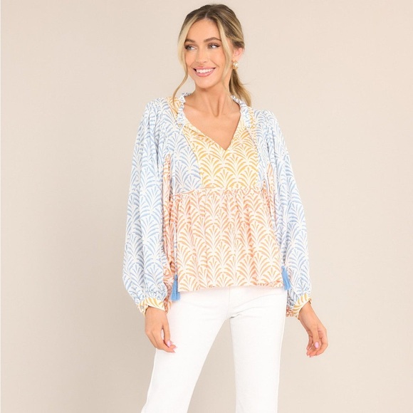 JUST STOPPING BY SPICED CORAL MULTI PRINT TOP
Red Dress Boutique - Picture 3 of 5